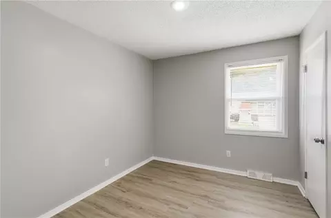 Bedroom - 6405 E 140th Ter, Grandview, MO 64030 photo 6 of 9