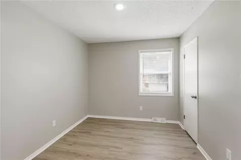 Bedroom - 6405 E 140th Ter, Grandview, MO 64030 photo 7 of 9