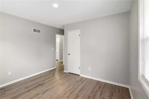 Bedroom - 6405 E 140th Ter, Grandview, MO 64030 photo 5 of 9