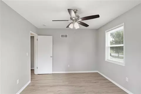 Bedroom - 6405 E 140th Ter, Grandview, MO 64030 photo 2 of 9