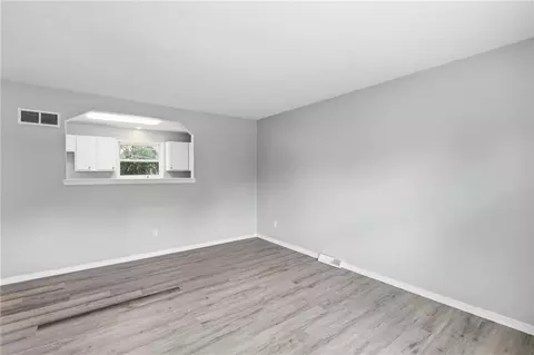 Living - 6405 E 140th Ter, Grandview, MO 64030 photo 5 of 11