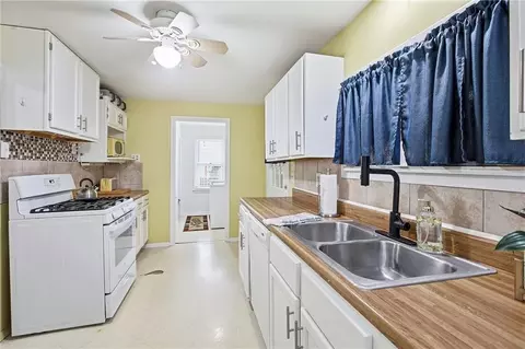 Kitchen - 309 E Kansas Ave, Independence, MO 64050 photo 3 of 5