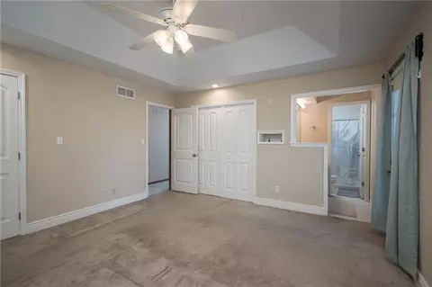 Bedroom - 404 S Sunset Ln, Raymore, MO 64083 photo 3 of 7
