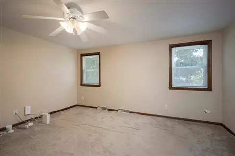 Bedroom - 404 S Sunset Ln, Raymore, MO 64083 photo 5 of 7