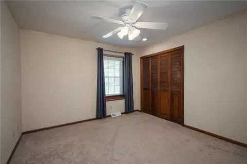 Bedroom - 404 S Sunset Ln, Raymore, MO 64083 photo 4 of 7