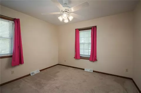 Bedroom - 404 S Sunset Ln, Raymore, MO 64083 photo 6 of 7