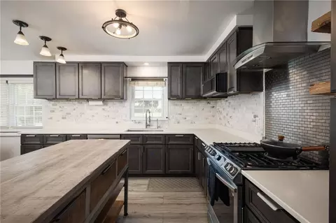 Kitchen - 404 S Sunset Ln, Raymore, MO 64083 photo 1 of 4