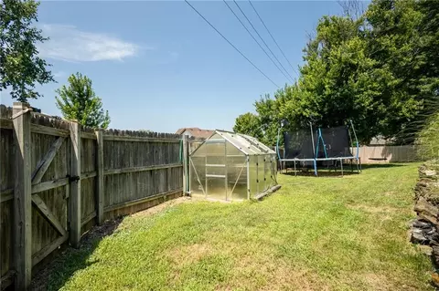 Exterior - 404 S Sunset Ln, Raymore, MO 64083 photo 17 of 21