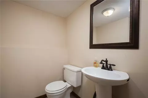 Bath - 404 S Sunset Ln, Raymore, MO 64083 photo 2 of 4