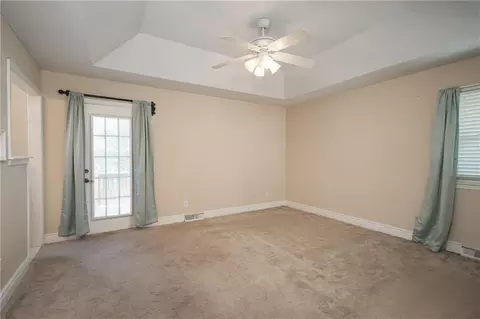 Bedroom - 404 S Sunset Ln, Raymore, MO 64083 photo 1 of 7