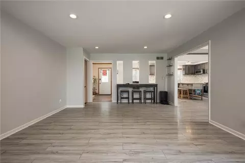 Living - 404 S Sunset Ln, Raymore, MO 64083 photo 4 of 6