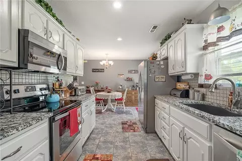 Kitchen - 15562 E Kaw Rapids Rd, Nevada, MO 64772 photo 3 of 3