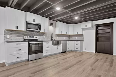 Kitchen - 17618 S Emerald View Dr, Raymore, MO 64083 photo 2 of 2