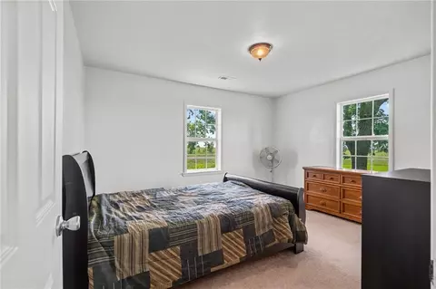 Bedroom - 9012 NW State Route 52 Hwy, Amoret, MO 64722 photo 2 of 5