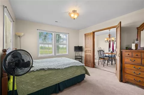 Bedroom - 9012 NW State Route 52 Hwy, Amoret, MO 64722 photo 4 of 5