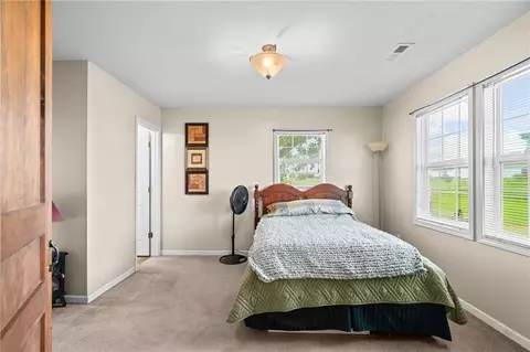 Bedroom - 9012 NW State Route 52 Hwy, Amoret, MO 64722 photo 3 of 5