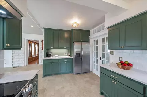 Kitchen - 105 NE Douglas St, Lees Summit, MO 64063 photo 3 of 5