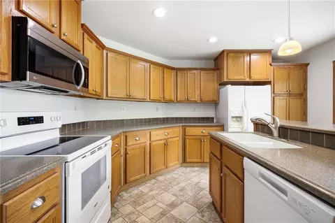 Kitchen - 13520 S Sam Moore Rd, Lone Jack, MO 64070 photo 3 of 6