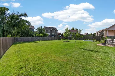 Exterior - 420 Meadowlark Dr, Raymore, MO 64083 photo 9 of 10