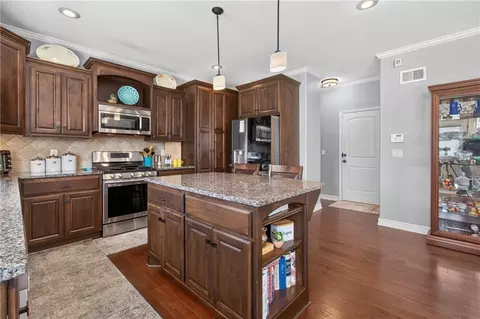 Kitchen - 420 Meadowlark Dr, Raymore, MO 64083 photo 3 of 4