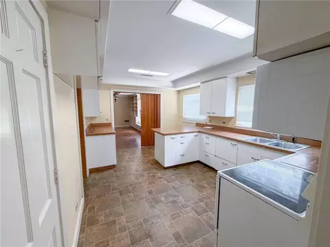 Kitchen - 401 E Broadway St, Iola, KS 66749 photo 1 of 6