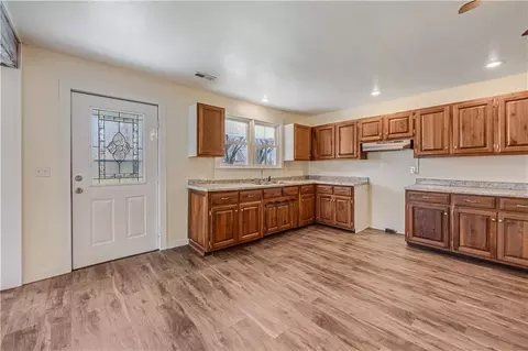 Kitchen - 304 S Chestnut St, La Monte, MO 65337 photo 2 of 3