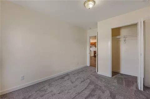Bedroom - 304 S Chestnut St, La Monte, MO 65337 photo 3 of 9