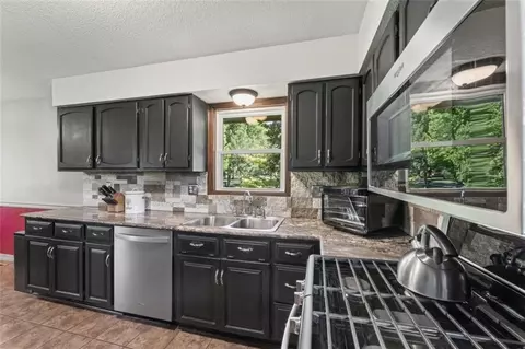 Kitchen - 892 Gregory St, Peculiar, MO 64078 photo 2 of 2