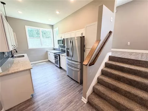 Kitchen - 403 N Devasher Rd, Warrensburg, MO 64093 photo 2 of 4