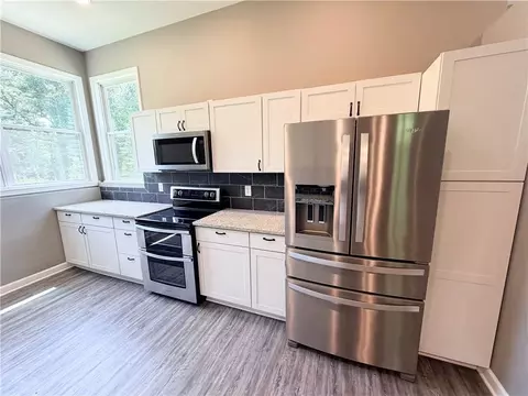 Kitchen - 403 N Devasher Rd, Warrensburg, MO 64093 photo 3 of 4