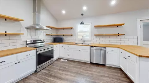Kitchen - 104 E 2nd St, Lamar, MO 64759 photo 1 of 2