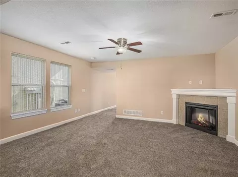 Living - 254 Pointe Ln, Raymore, MO 64083 photo 3 of 4