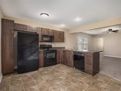 Kitchen - 254 Pointe Ln, Raymore, MO 64083 photo 1 of 2