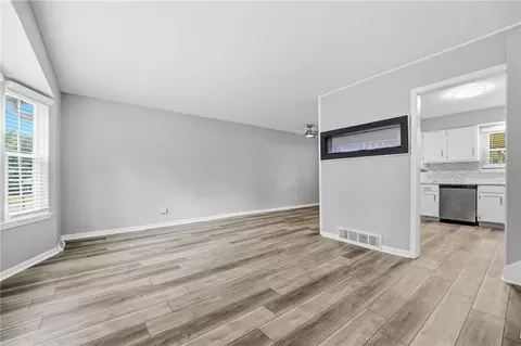 Living - 1010 E Langsford Rd, Lees Summit, MO 64063 photo 1 of 5