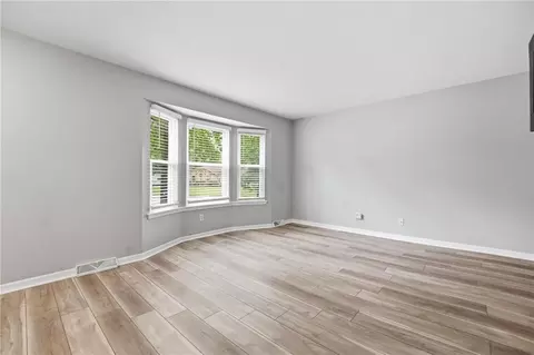 Living - 1010 E Langsford Rd, Lees Summit, MO 64063 photo 2 of 5