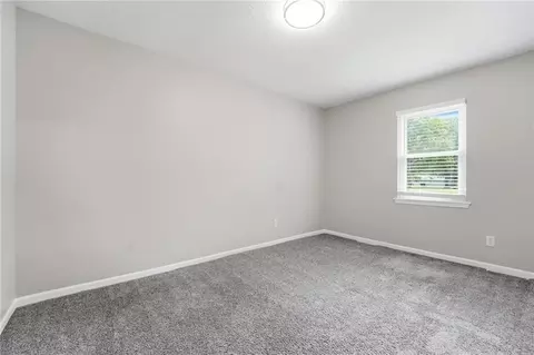 Bedroom - 1010 E Langsford Rd, Lees Summit, MO 64063 photo 5 of 8