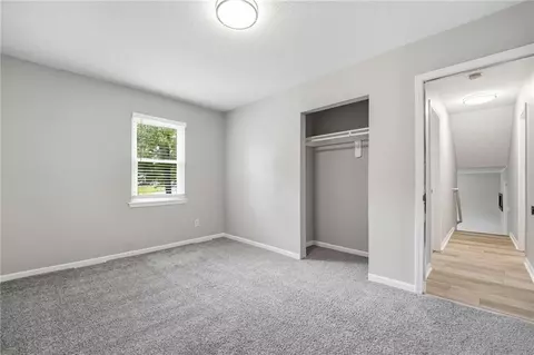 Bedroom - 1010 E Langsford Rd, Lees Summit, MO 64063 photo 6 of 8