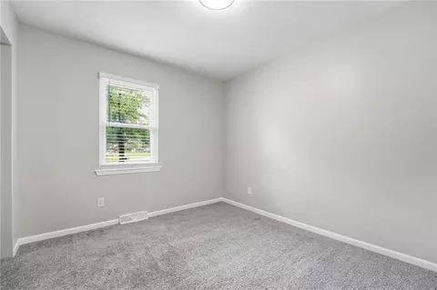 Bedroom - 1010 E Langsford Rd, Lees Summit, MO 64063 photo 7 of 8