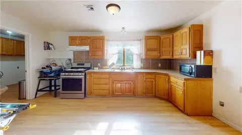 Kitchen - 1418 N Cedar St, Nevada, MO 64772 photo 1 of 2