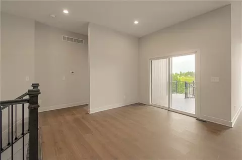 Living - 1152 SW Whitby Dr, Lees Summit, MO 64083 photo 6 of 9