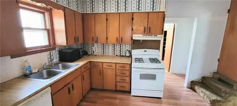Kitchen - 716 E Lincoln St, Iola, KS 66749 photo 2 of 2