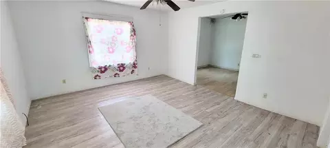Living - 716 E Lincoln St, Iola, KS 66749 photo 1 of 2