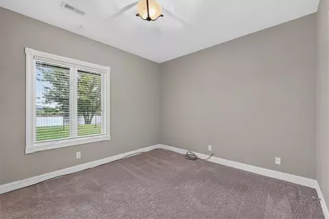 Bedroom - 1328 E Walnut St, Raymore, MO 64083 photo 6 of 7