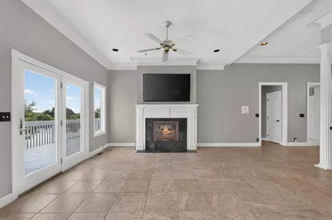 Living - 1328 E Walnut St, Raymore, MO 64083 photo 4 of 7