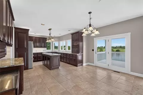 Kitchen - 1328 E Walnut St, Raymore, MO 64083 photo 1 of 6