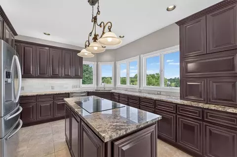 Kitchen - 1328 E Walnut St, Raymore, MO 64083 photo 3 of 6