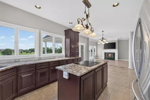 Kitchen - 1328 E Walnut St, Raymore, MO 64083 photo 4 of 6