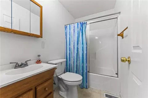 Bath - 413 Elm St, Polo, MO 64671 photo 2 of 3