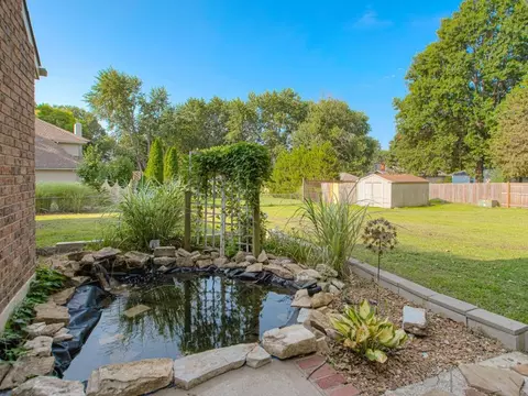Exterior - 406 Meadow Ln, Raymore, MO 64083 photo 4 of 11
