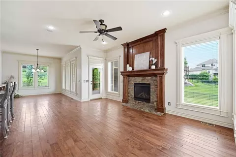 Living - 324 NW Thoreau Cir, Lees Summit, MO 64081 photo 8 of 17
